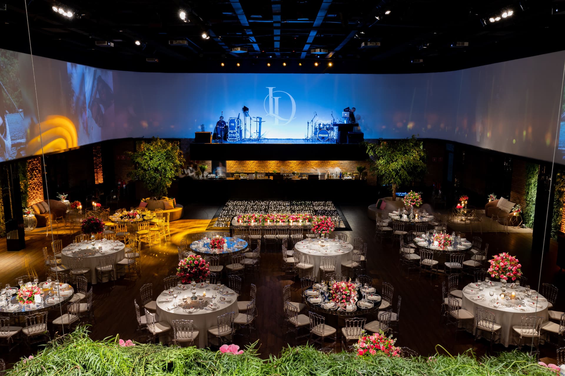 Round tables and linens set inside the Berkley Event Center hall