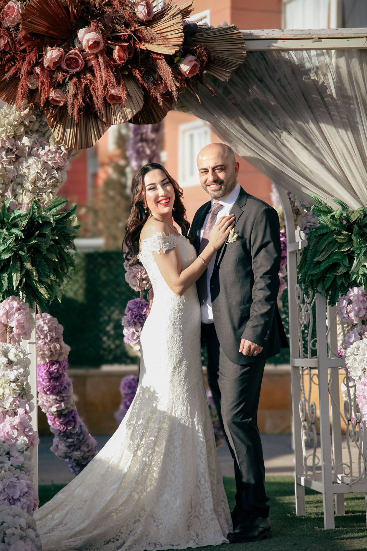 Floral ceremony arch set for an outdoor wedding
